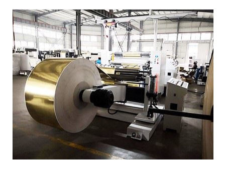 ماكينة تقطيع الورق بسكين لولبي مزدوج (شيتر تقطيع مزدوج دوار) 				   Double Spiral Knives Sheeter (Twin Rotary Sheeting Machine)