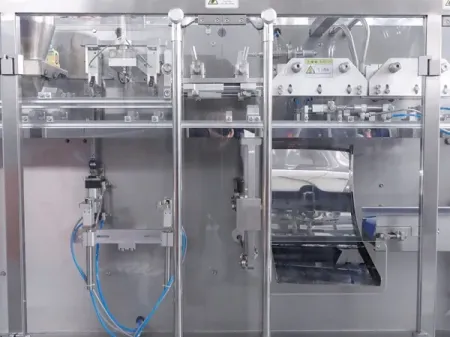 ماكينة تعبئة الأكياس الجاهزة مع وحدة تغذية أكياس آلية، ذات فوهة تعبئة واحدة