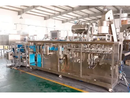 ماكينة تعبئة أكياس ستاند اب بفوهة HFFS ذات فوهة واحدة