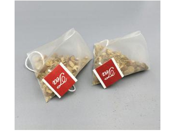 ماكينة تعبئة وتغليف الشاي في كيس هرمي (ماكينة تعبئة وتغليف رأسية MK-SJB)                   Pyramid Tea Bag Packaging Machine (VFFS Machine)